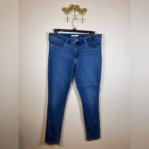 Levi's Women's Dark Blue 311 Shaping Skinny Jeans 5 pocket design. Size 33